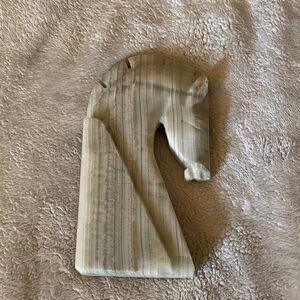 Stone 1970’s Horse Head Bookend, google, lens says onyx. Glows